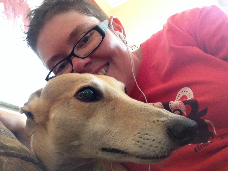 a rare shot of millie, one of my longtime dog walking clients, letting me love on her